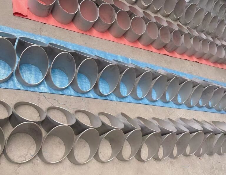 Rows of 304 and 316 stainless steel pipe sections with angled cut ends
